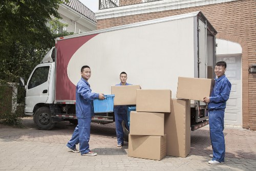 Removal team preparing a home move in New Malden