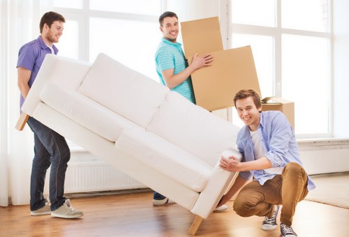 Preparation checklist and packed boxes for moving home in New Malden