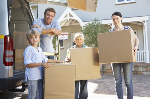 Removal team planning a moving day in New Malden