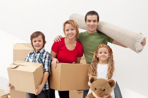 Removal van being loaded outside a New Malden property