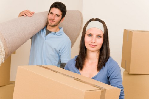 Office furniture and equipment being prepared for a local move